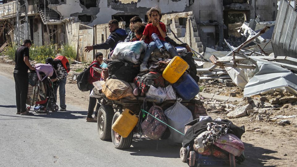 Displaced Palestinians flee with their families and belongings after an order to evacuate the northern part of Gaza by the Israeli military, in Jabalya, northern Gaza on October 22. 